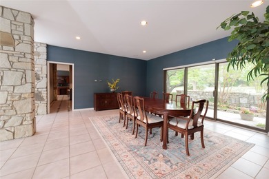 This landmark property, nestled on 35 landscaped acres within - photo 10