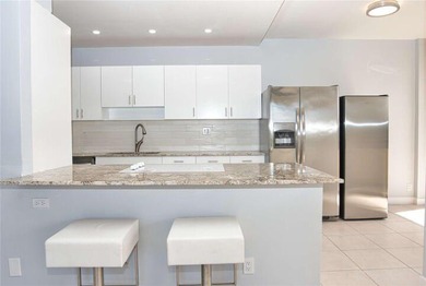 Beautifully renovated 2-bedroom, 2-bath corner residence on the - photo 3