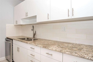 Beautifully renovated 2-bedroom, 2-bath corner residence on the - photo 4