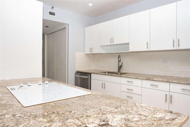 Beautifully renovated 2-bedroom, 2-bath corner residence on the - photo 5