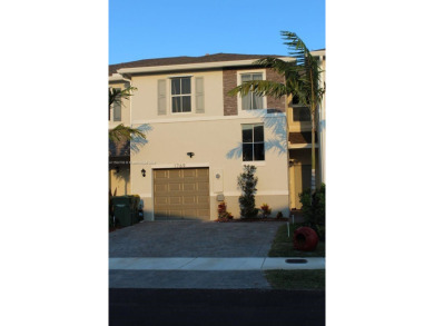Lake Townhome/Townhouse Off Market in Homestead, Florida
