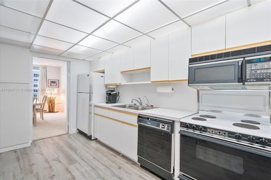 Sunlit and immaculate 1,225 sq ft oceanfront 1BR + den / 2BA