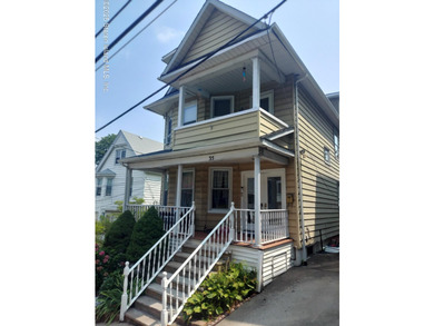 THIS BEAUTIFULLY MAINTAINED 2 FAMILY DETACHED HOME ON ONE OF THE - photo 1