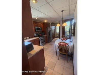 THIS BEAUTIFULLY MAINTAINED 2 FAMILY DETACHED HOME ON ONE OF THE - photo 8