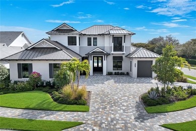 Discover a serene lakefront sanctuary in one of Naples' most - photo 3