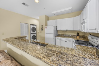 Welcome to this 2-bedroom, 2-bathroom first-floor condo located