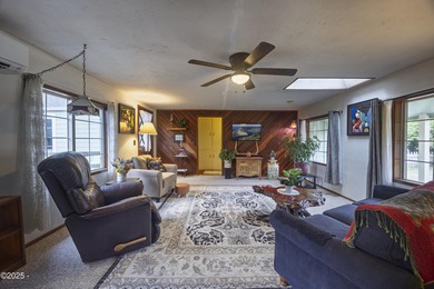 Enjoy the feel of country living on this .60-acre property just