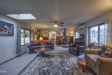 Enjoy the feel of country living on this .60-acre property just