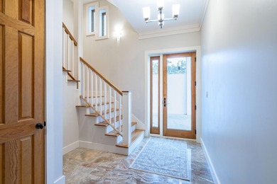 Built by original owners with a 8ft. concrete privacy wall, new - photo 5