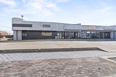 One of a kind Beachside, Ocean Block Strip Center located on the - photo 2