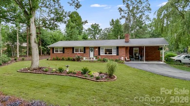 Enjoy the best of one-level living in this beautifully - photo 1