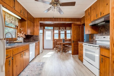 Welcome to this charming seasonal cabin on beautiful Lake - photo 3