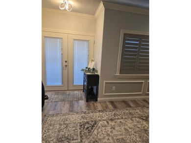 Ideally located along the perimeter wall near the front gate &