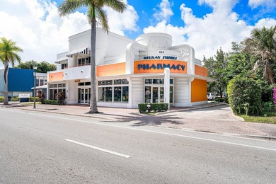 124 NE 5th Ave offers a rare opportunity to acquire a - photo 1