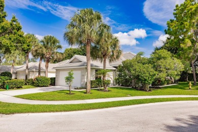 Lake Home For Sale in Palm Beach Gardens, Florida