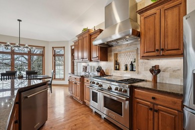 Stunning custom, all-brick executive lake home with 93' of - photo 11