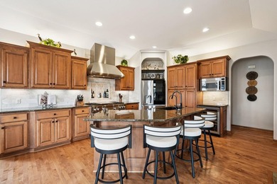 Stunning custom, all-brick executive lake home with 93' of - photo 13