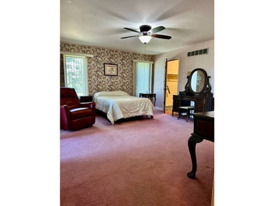 Situated on 5.2 acres+/- with stocked pond and country living - photo 14
