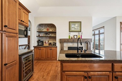 Stunning custom, all-brick executive lake home with 93' of - photo 15