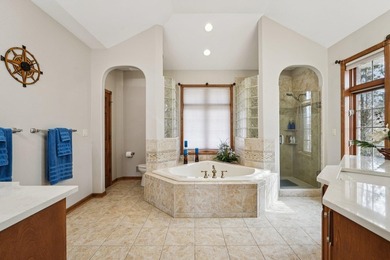 Stunning custom, all-brick executive lake home with 93' of - photo 22