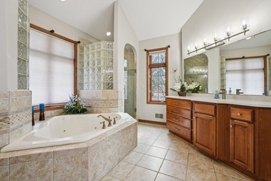 Stunning custom, all-brick executive lake home with 93' of - photo 23