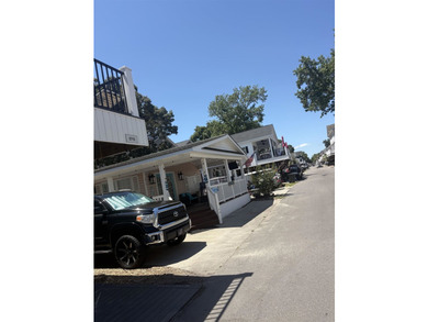 Bright and roomy 3BR/2BA cottage, fully furnished, is located - photo 3
