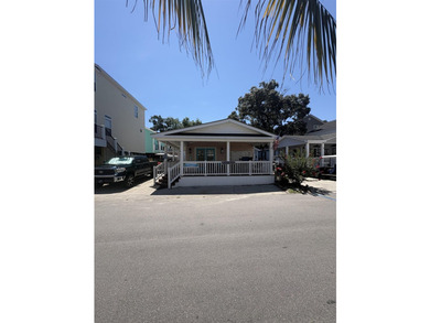 Bright and roomy 3BR/2BA cottage, fully furnished, is located - photo 6
