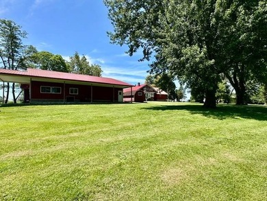 Situated on 5.2 acres+/- with stocked pond and country living - photo 47