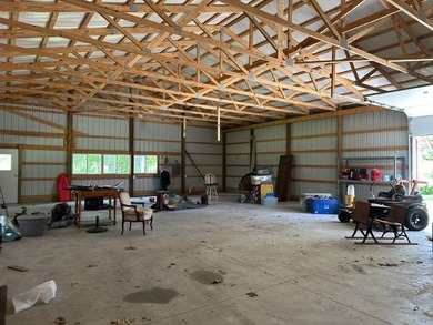 Situated on 5.2 acres+/- with stocked pond and country living - photo 49