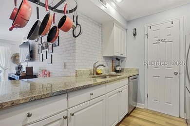 This first-floor 2BR/2BA villa in Palmetto Commons presents a - photo 6