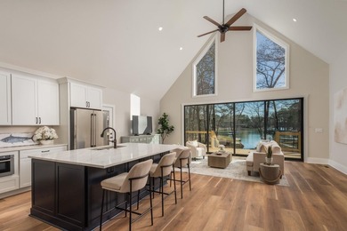 Completely remodeled from top to bottom, this lakefront home is - photo 12