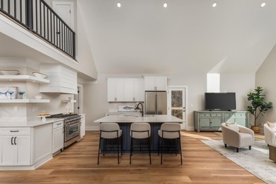 Completely remodeled from top to bottom, this lakefront home is - photo 14