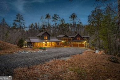 Set on 8.5 pristine acres, this extraordinary custom-built cabin