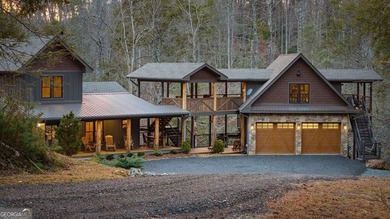 Set on 8.5 pristine acres, this extraordinary custom-built cabin
