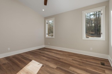 Completely remodeled from top to bottom, this lakefront home is - photo 33