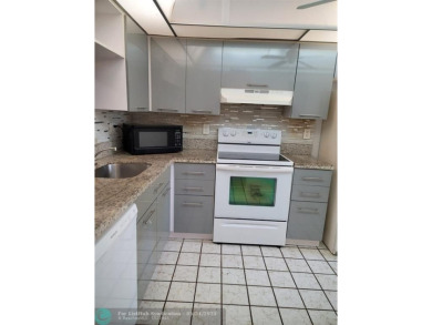 Lake Condo For Sale in Pembroke Pines, Florida