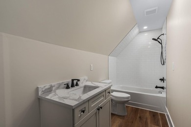 Completely remodeled from top to bottom, this lakefront home is - photo 44