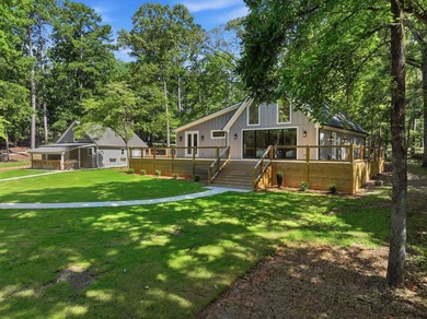 Completely remodeled from top to bottom, this lakefront home is - photo 45