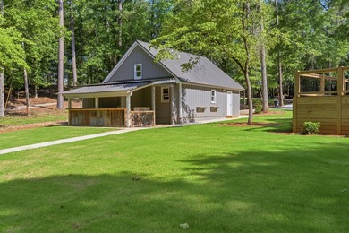 Completely remodeled from top to bottom, this lakefront home is - photo 46