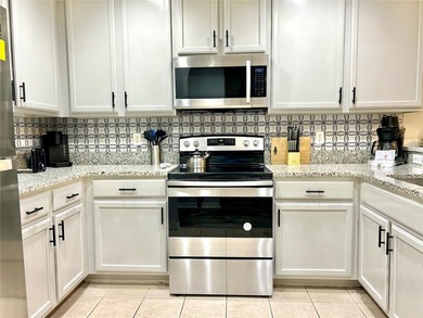 Welcome to 9055 Treasure Trove Ln #105, a charming and - photo 3