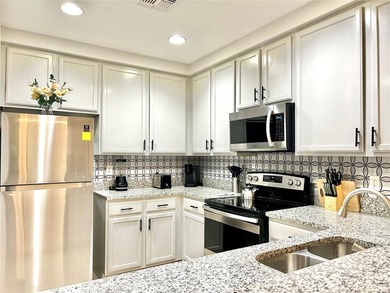 Welcome to 9055 Treasure Trove Ln #105, a charming and - photo 4