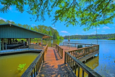 TURNKEY WATERFRONT on 2 pristine acres! This FULLY FURNISHED - photo 2