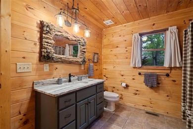 A peaceful lakeside escape awaits in this charming mountain - photo 12