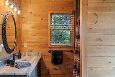 A peaceful lakeside escape awaits in this charming mountain - photo 16