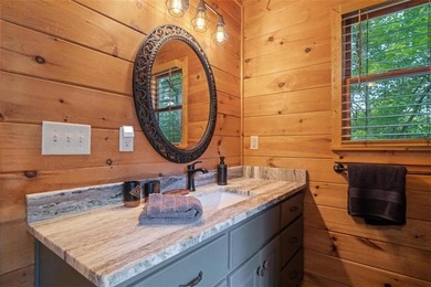 A peaceful lakeside escape awaits in this charming mountain - photo 23