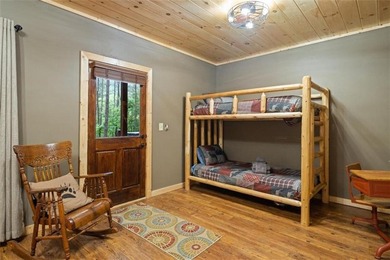 A peaceful lakeside escape awaits in this charming mountain - photo 30