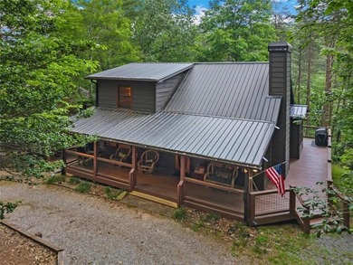 A peaceful lakeside escape awaits in this charming mountain - photo 34