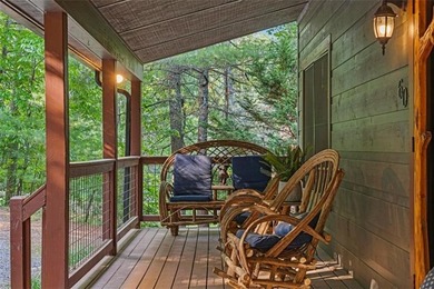 A peaceful lakeside escape awaits in this charming mountain - photo 36