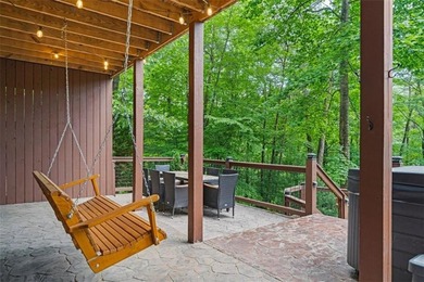 A peaceful lakeside escape awaits in this charming mountain - photo 39