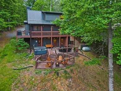A peaceful lakeside escape awaits in this charming mountain - photo 47